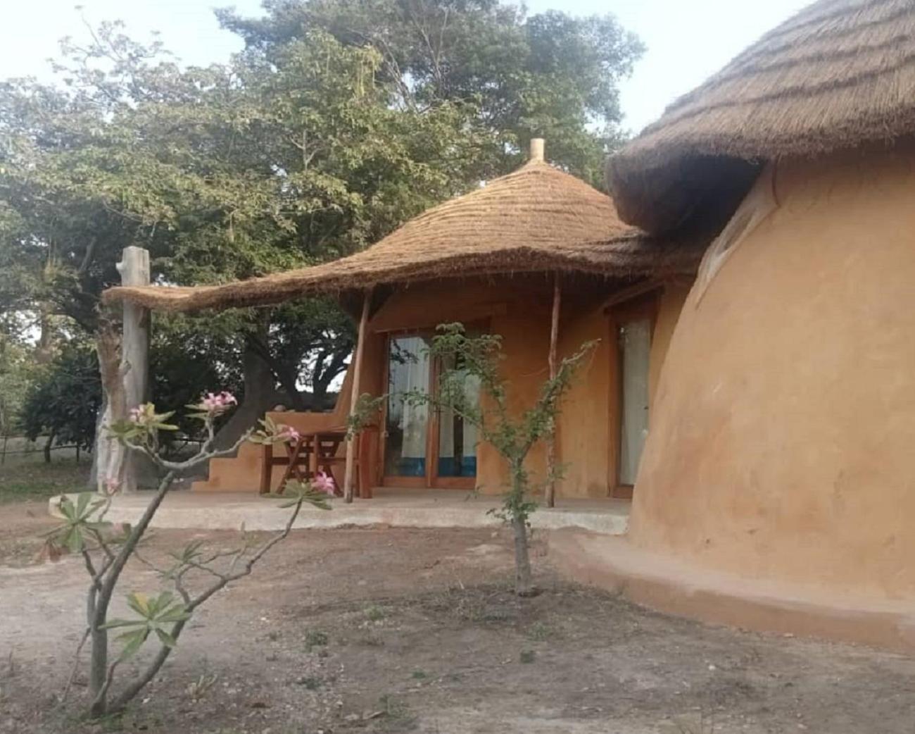 Les Collines De Niassam Villa Palmarin Exteriör bild