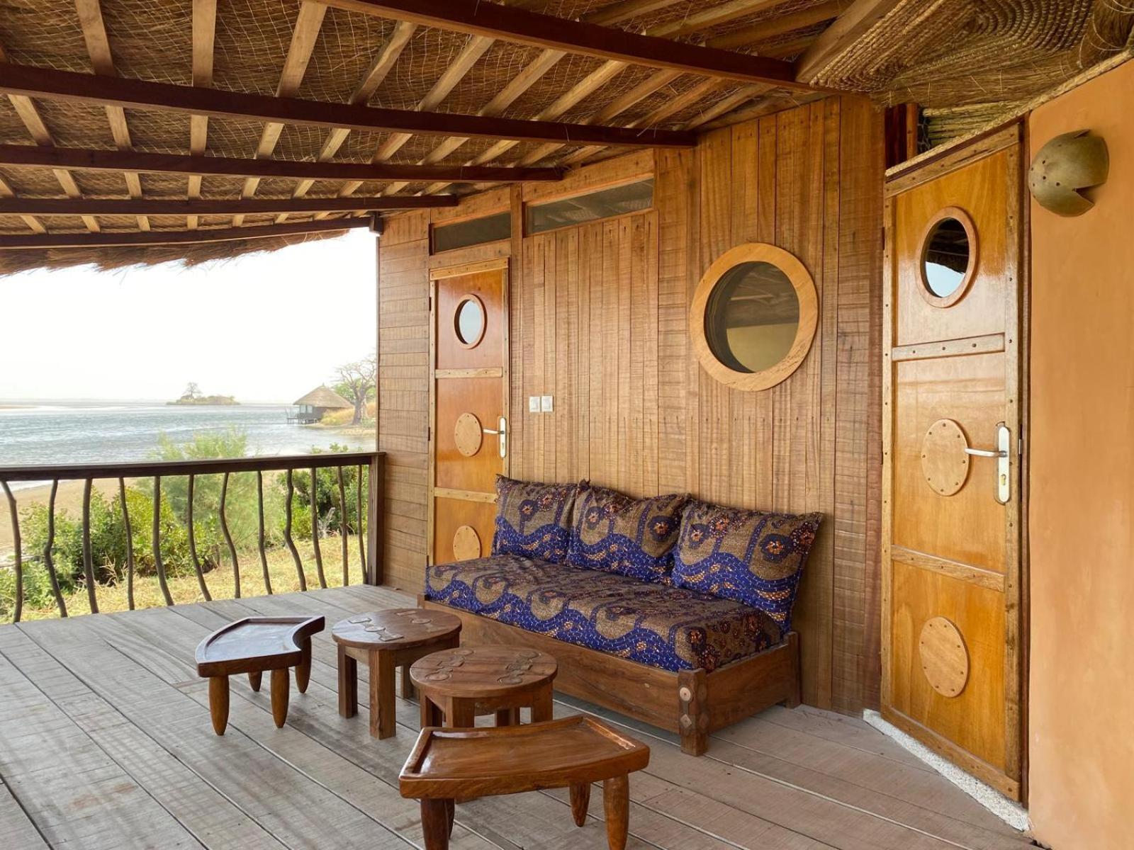 Les Collines De Niassam Villa Palmarin Exteriör bild